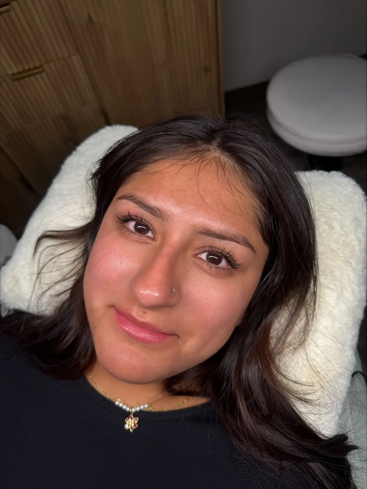 Client with a soft, natural Korean lash lift and curl