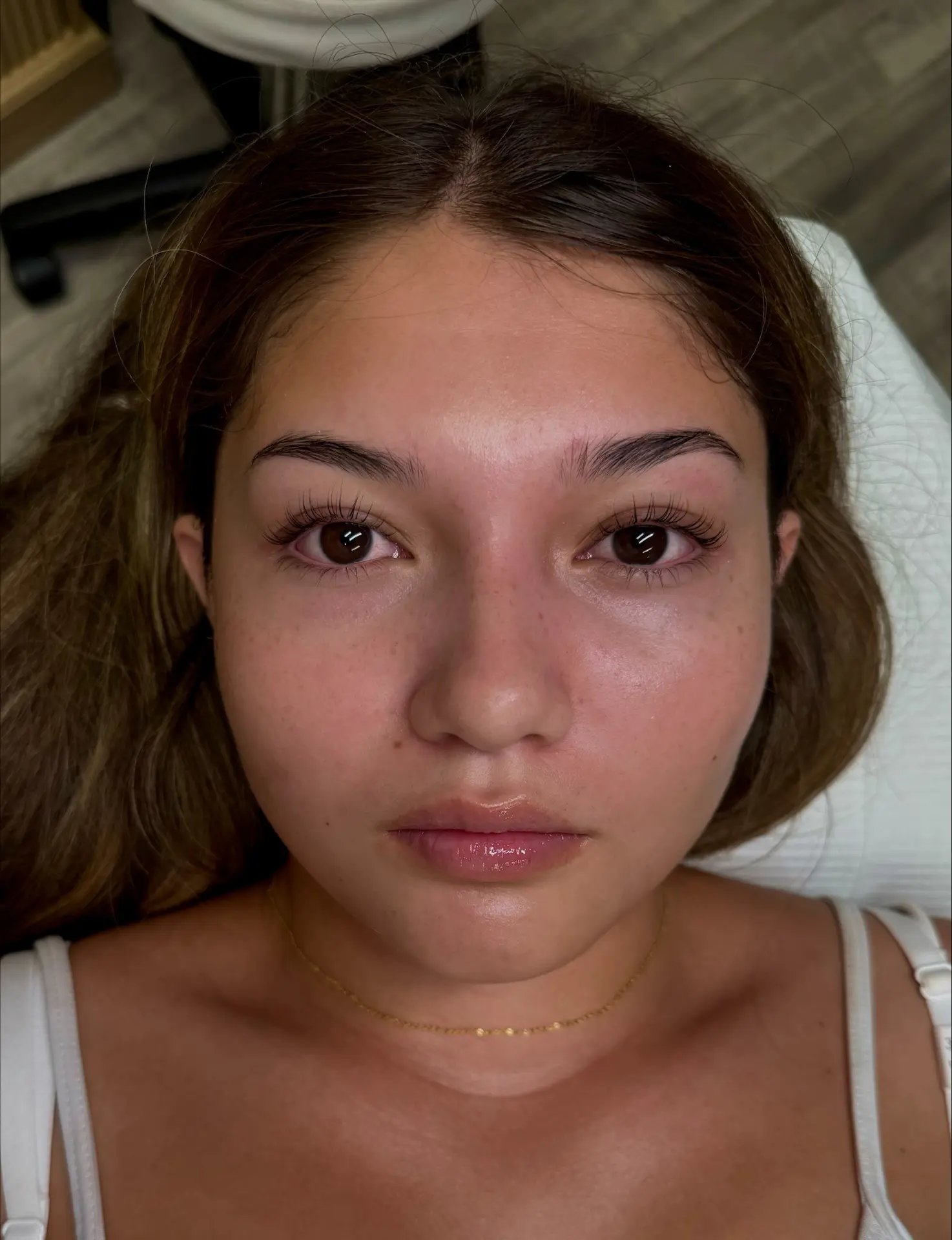 Lifted, curled natural lashes framing the eyes